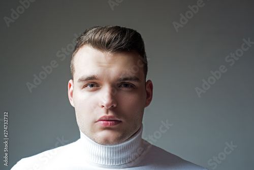 Well groomed man stylish appearance. Hairstyle barber. Styling hair wax. Hipster hairstyle. Man close up face with glossy hairstyle. Barbershop concept. Handsome guy. Masculinity and beauty photo