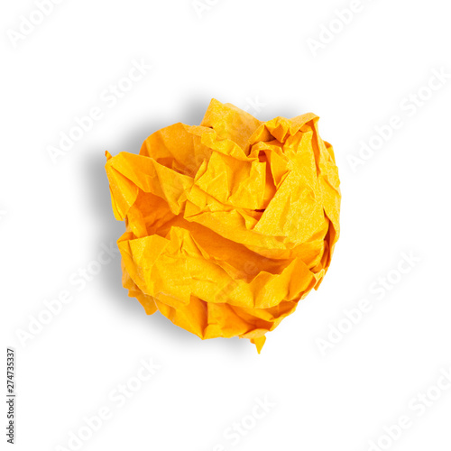 crumpled yellow orange paper ball on white background isolation