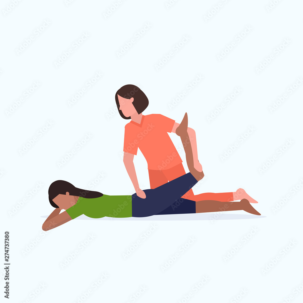 female personal trainer doing stretching exercises with african american girl fitness instructor helping woman to stretch muscles workout concept flat full length female personal trainer doing stretching exercises with african american girl fitness instructor helping woman to stretch muscles workout concept flat full length