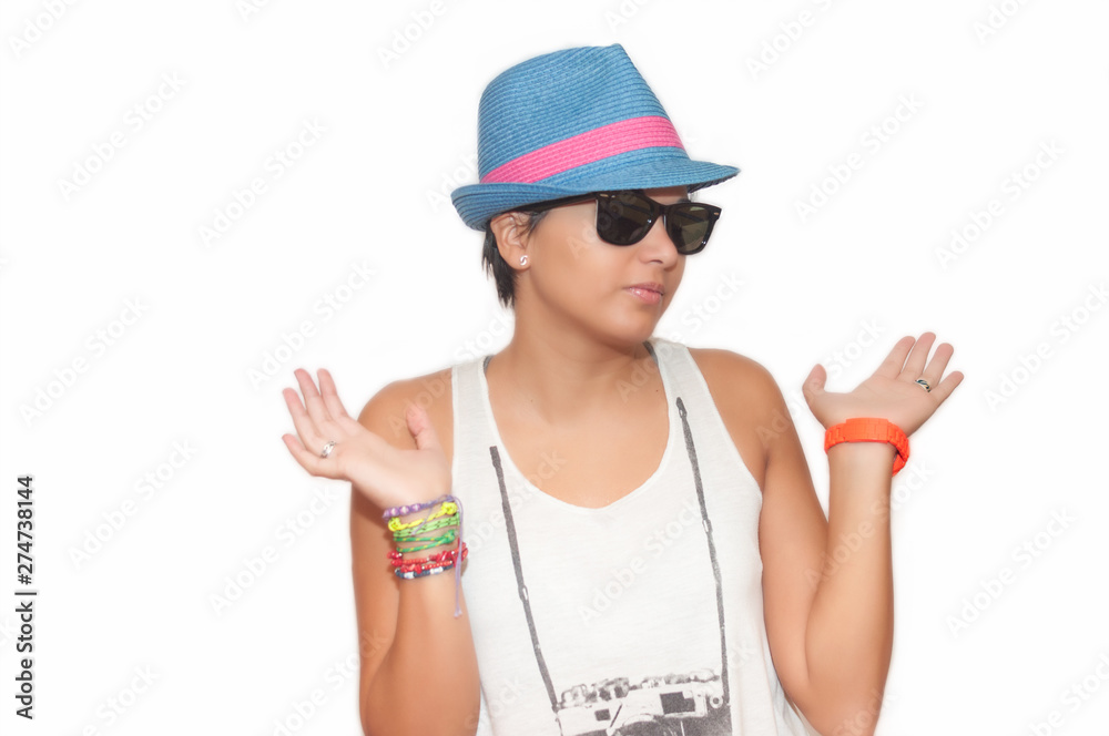 Young girl expressing surprise with hat and sunglasses Young girl expressing surprise with hat and sunglasses