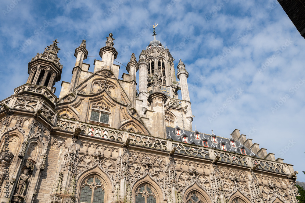 Fototapeta premium Side view of the beautiful Middelburg Town Hall against the sky, Netherlands