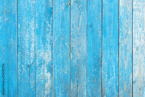 Texture wall wooden blue background. Background of the tree, planks blue color, free without objects. Fence harvesting wood horizontal boards wall.