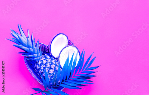 Tropical neon background with blue palm leaves. Trendy colors 2019. 