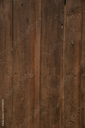 Rough wooden planks in an old door