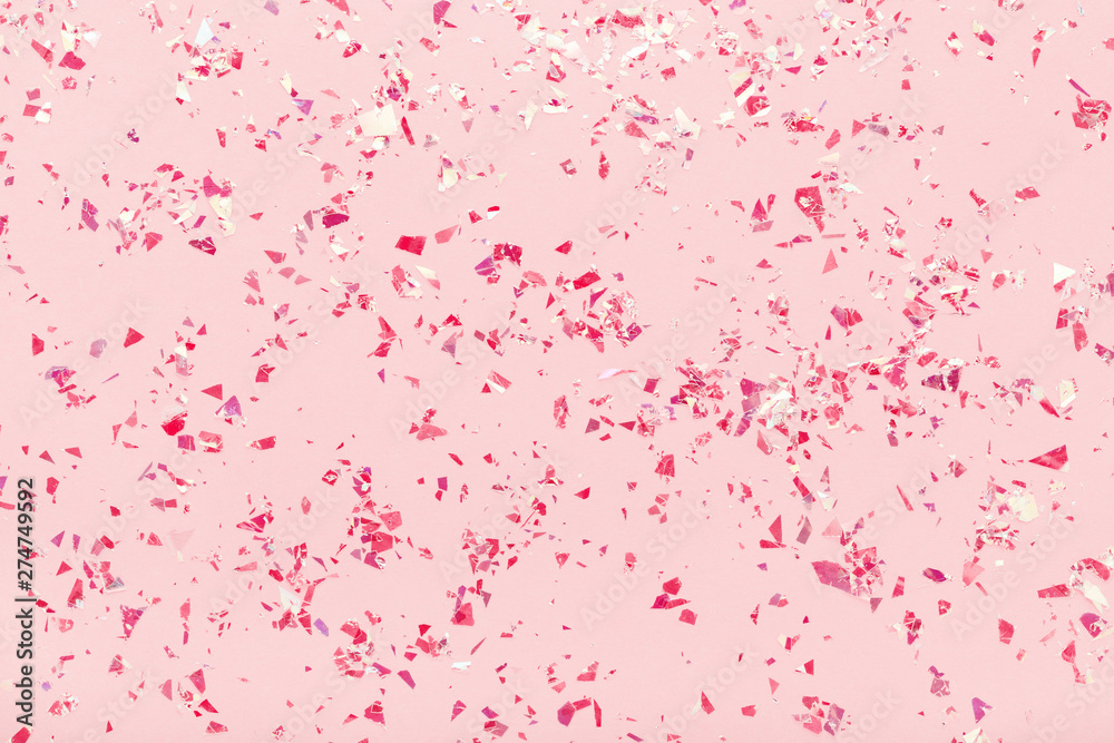 Glitter mica. Red sparkles on pink pastel trendy background. Festive abstract backdrop with confetti. Flat lay. Glitter mica. Red sparkles on pink pastel trendy background. Festive abstract backdrop with confetti. Flat lay.