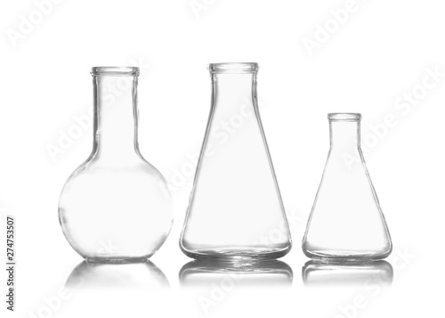 Group of empty chemistry glassware isolated on white