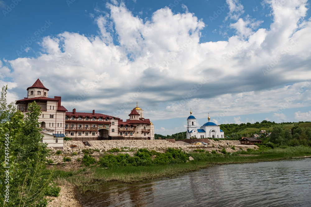 terrain, landscape, monastery, territory, architecture, style, buildings, Church, blue, sky, white, clouds, river, water, shore, beauty