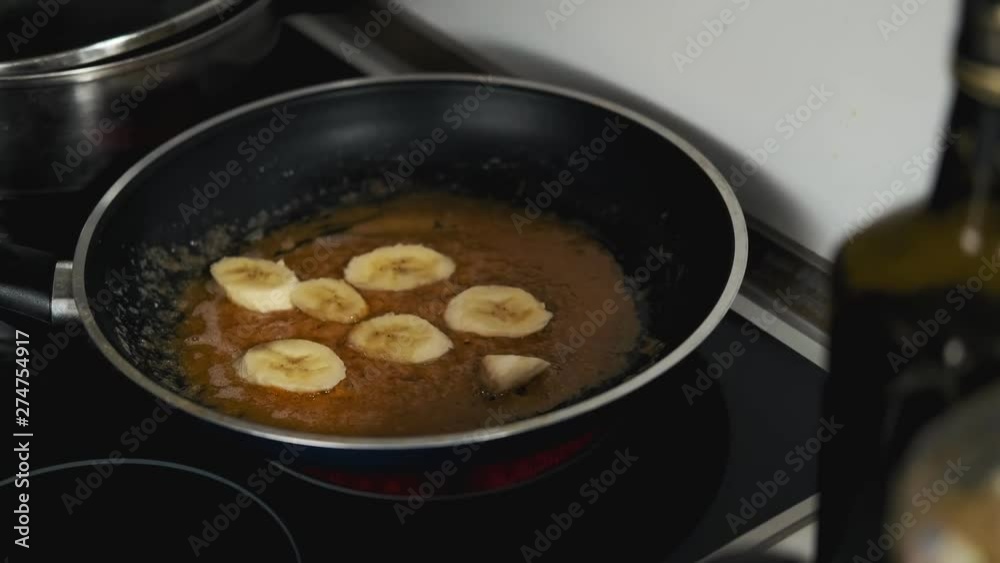 Caramelized bananas in pan. Preparing dessert. Step by step. Caramelized bananas in pan. Preparing dessert. Step by step.