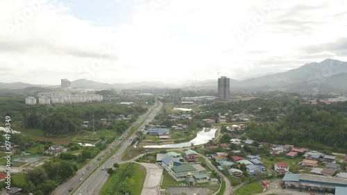 Aerial drone footage of beautiful rural town of Menggatal Town, Sabah, Malaysia photo