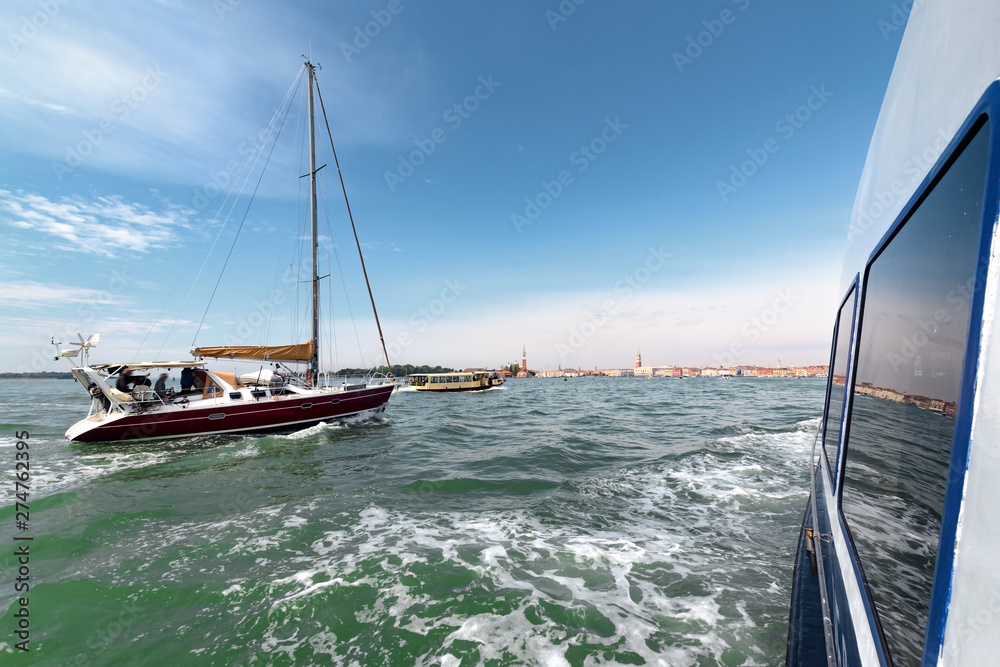 Fototapeta premium The yacht in Venice lagune. View from the ship