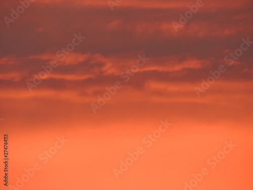 red sky with clouds