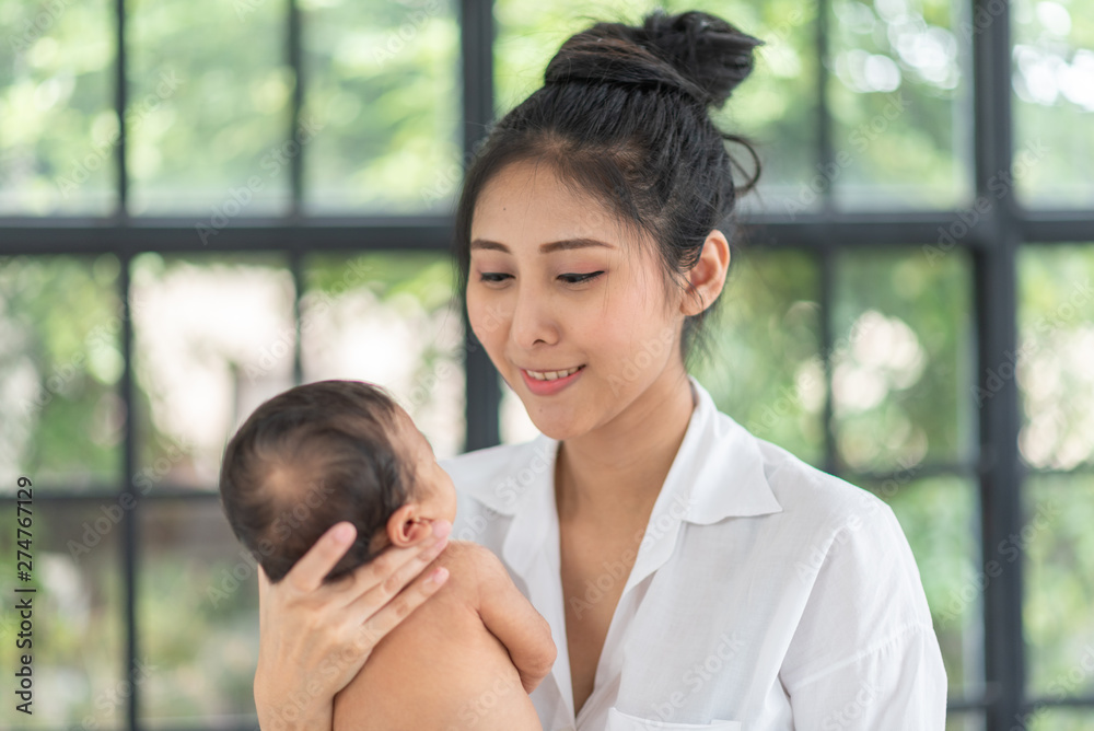 Showing the love of mother and newborn baby Showing the love of mother and newborn baby