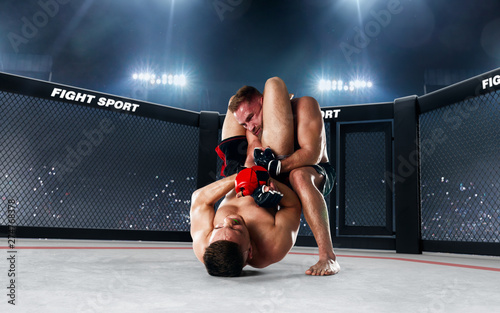 MMA fighters on ring. Fighting Championship.