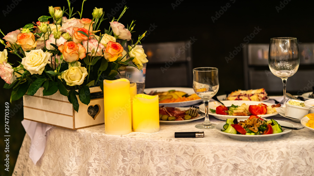 flowers and food are on the table, holiday flowers and food are on the table, holiday