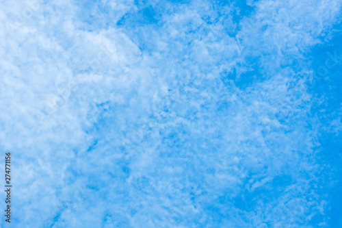 white cirrocumulus clouds on blue sky
