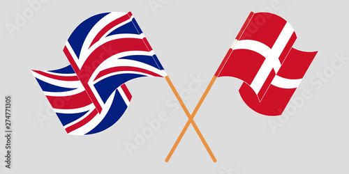 Crossed and waving flags of Denmark and UK