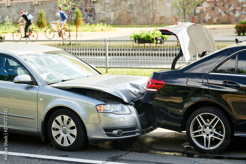 car crash accident on street. damaged automobiles