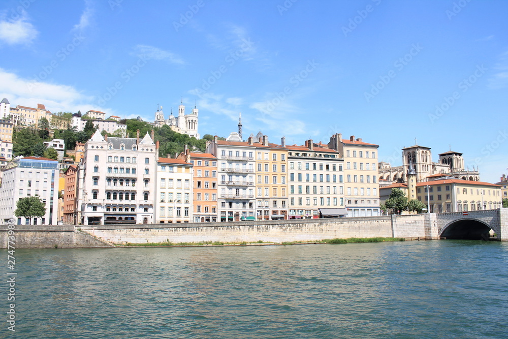 The old city of Lyon, the Saone river and the basilica of Notre Dame de Fourviere, France