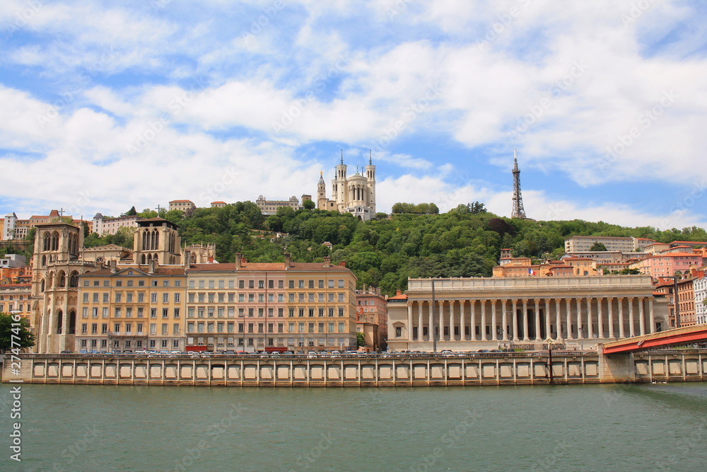 The old city of Lyon, the Saone river and the basilica of Notre Dame de Fourviere, France