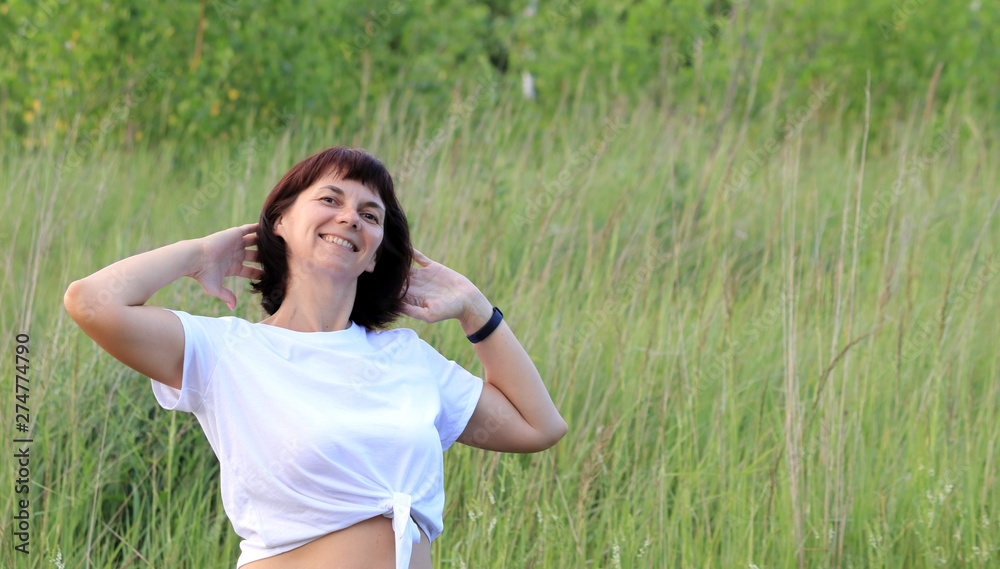 young woman in a field young woman in a field