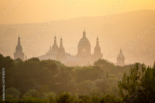 Silhouette of the Museum of Art of Catalonia in Barcelona in the haze at sunset