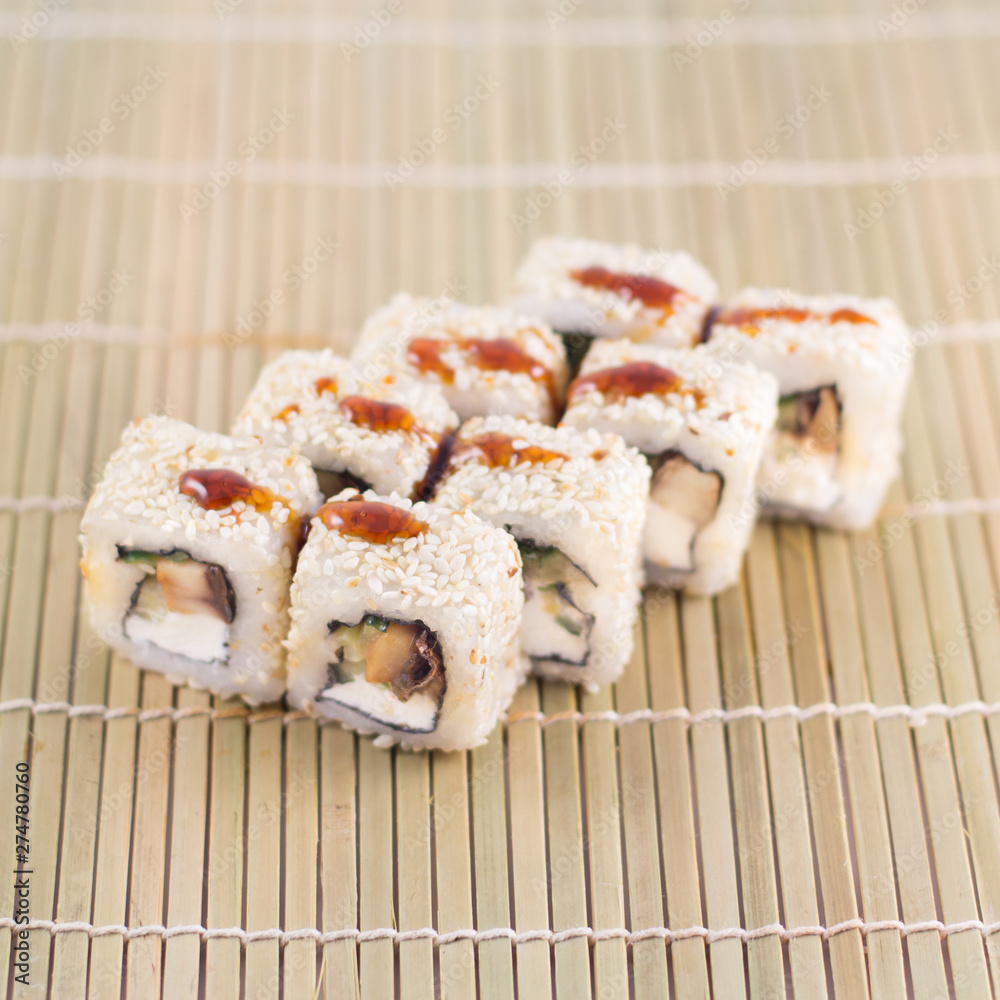 Isolated sushi / rolls.