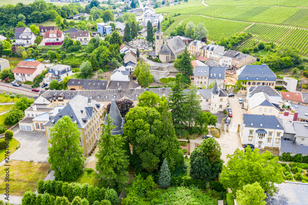 Aerial view of Schengen town center over River Moselle, Luxembourg, the place where Schengen Agreement signed, the birthplace of a Europe without borders. Tripoint of borders with Germany and France