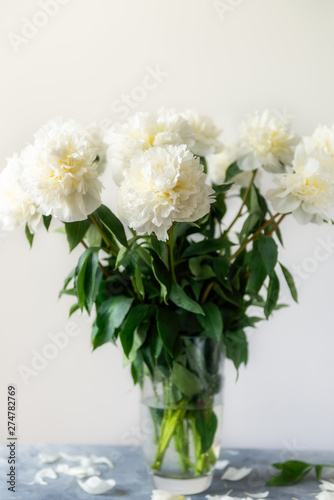Wallpaper Mural Bunch of amazing peonies in the vase on white wall background Torontodigital.ca