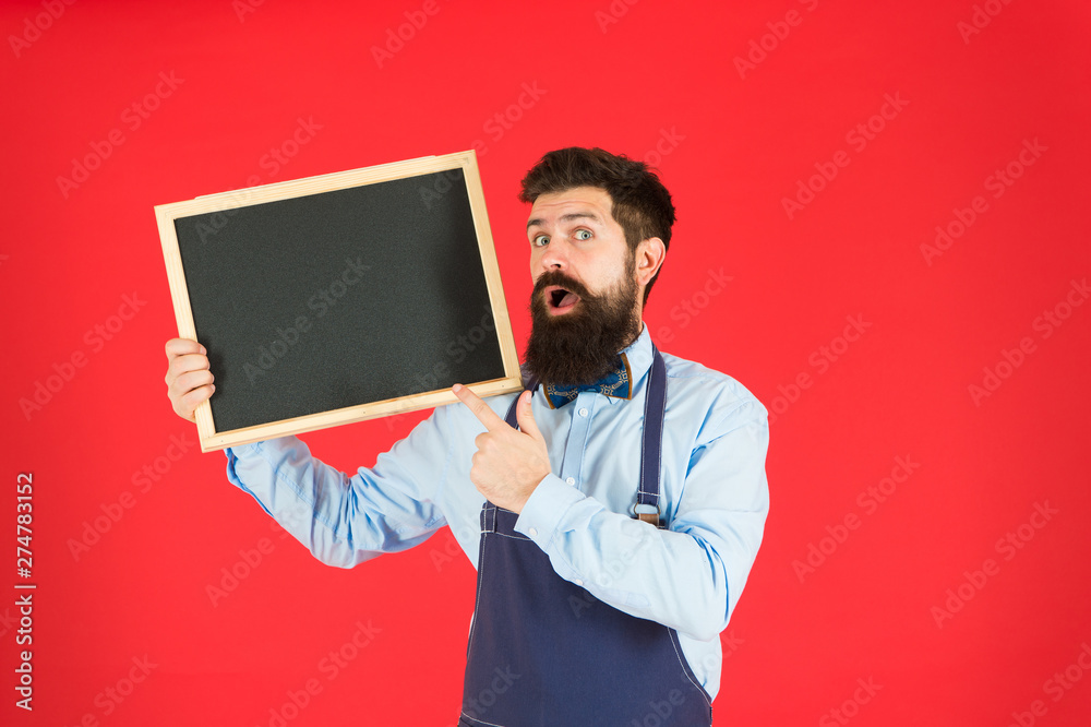 menu board. welcome. Restaurant or cafe advertising. bearded hipster cook. great cuisine. cooking by recipe. surprised man chef with blank blackboard, copy space. menu planning. our menu is best menu board. welcome. Restaurant or cafe advertising. bearded hipster cook. great cuisine. cooking by recipe. surprised man chef with blank blackboard, copy space. menu planning. our menu is best