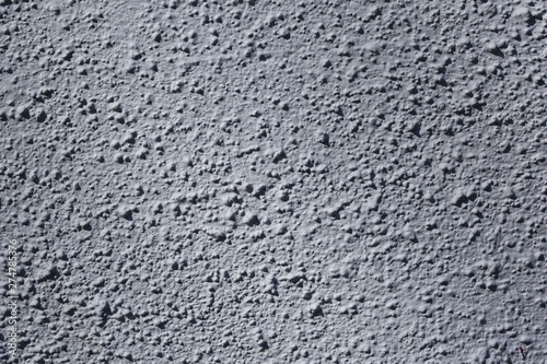 Beautiful background texture of rough bumpy surface. Gray backgrounds.