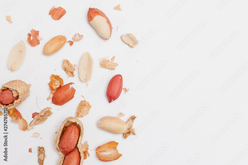 Creative layout made of hazelnut nuts, almonds, walnut, peanut, cashew on white background.Flat lay. Food concept. Creative layout made of hazelnut nuts, almonds, walnut, peanut, cashew on white background.Flat lay. Food concept.
