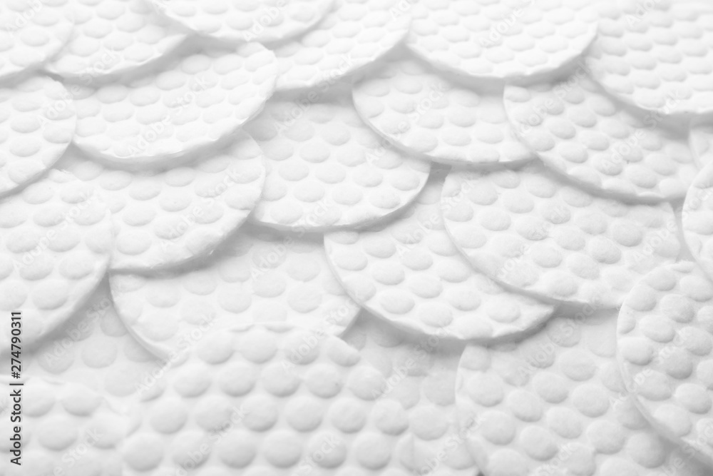 Naklejka premium Many cotton pads as background, closeup view