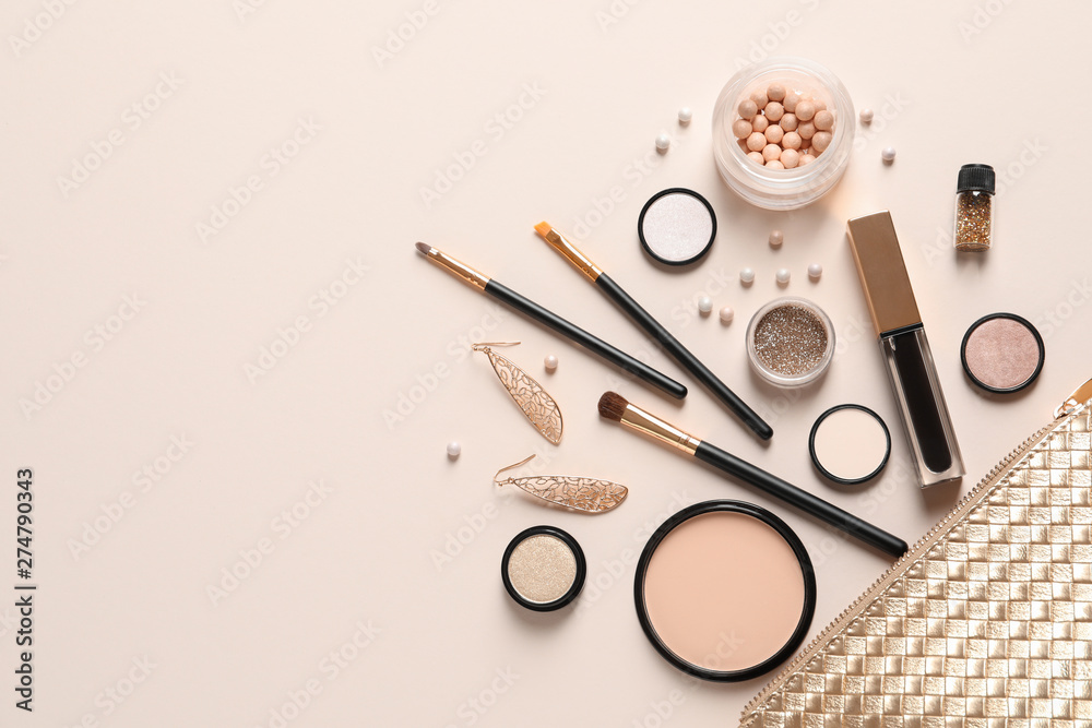 Cosmetic bag and different luxury makeup products on color background, flat  lay. Space for text Stock Photo | Adobe Stock