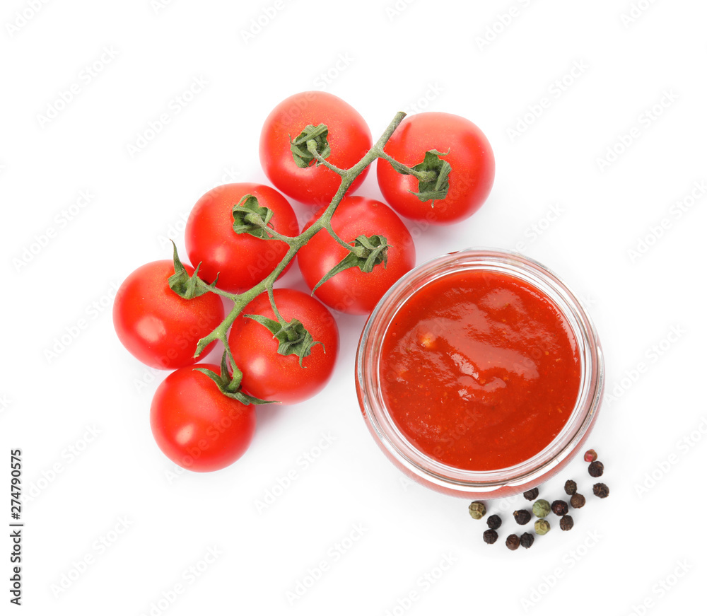 Jar of sauce and tomatoes isolated on white, top view Jar of sauce and tomatoes isolated on white, top view
