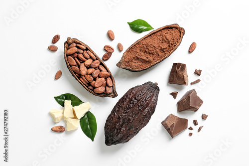 Composition with cocoa products on white background, top view