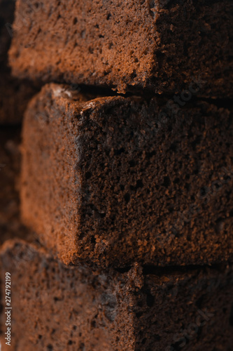 Fresh brownie as background, closeup. Delicious chocolate pie
