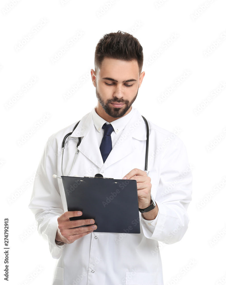 Young male doctor in uniform with clipboard isolated on white Young male doctor in uniform with clipboard isolated on white