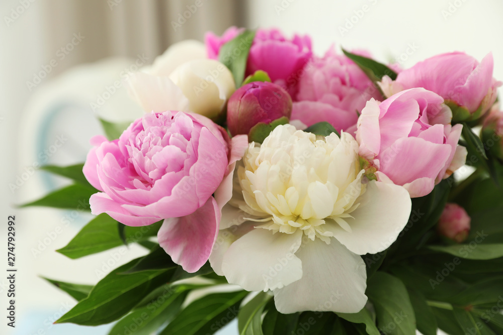 Bouquet of beautiful peonies on blurred background, closeup Bouquet of beautiful peonies on blurred background, closeup
