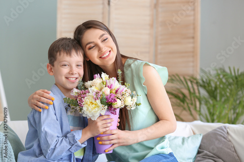 Young mother and son with b...