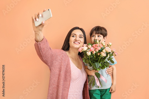 Happy mother and son taking...