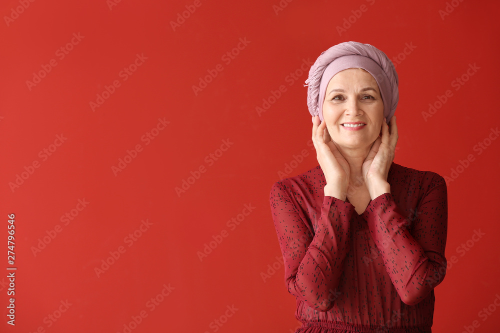Mature woman after chemotherapy on color background Mature woman after chemotherapy on color background