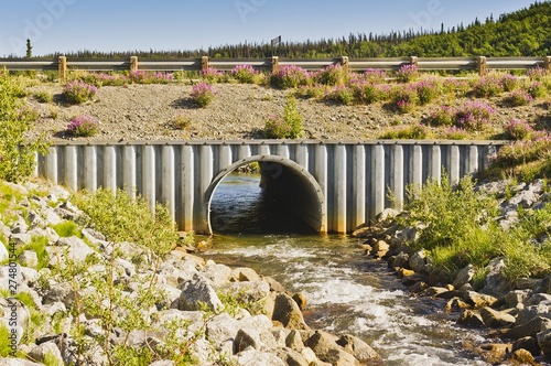 Creek and culvert along the Alaska highway in Yukon, Canada photo