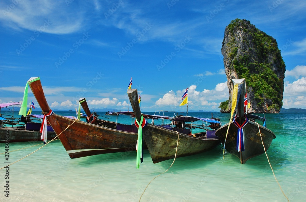 Clear water and blue sky, beautiful beach in Krabi / Thailand Clear water and blue sky, beautiful beach in Krabi / Thailand