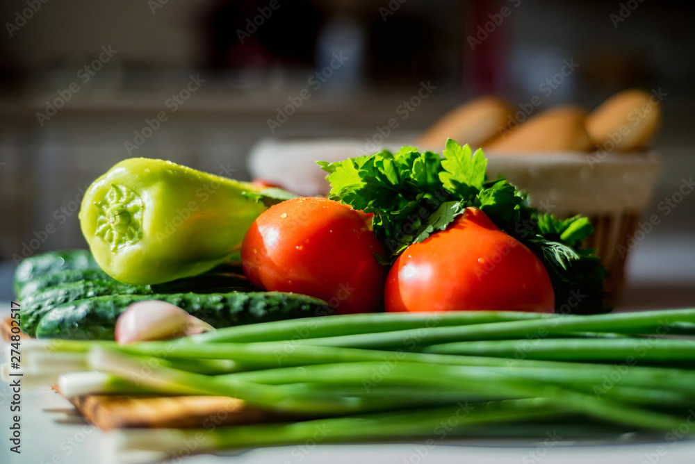 Fresh seasonal vegetables on wooden board on table. Fresh seasonal vegetables on wooden board on table.