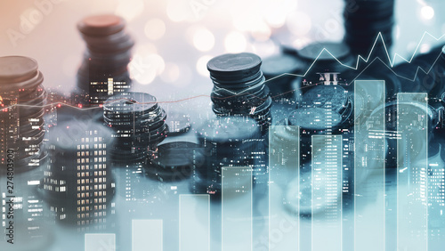 Double exposure of city view , diagram bar and line graph , rows of coins for finance , money , investment and business concept background