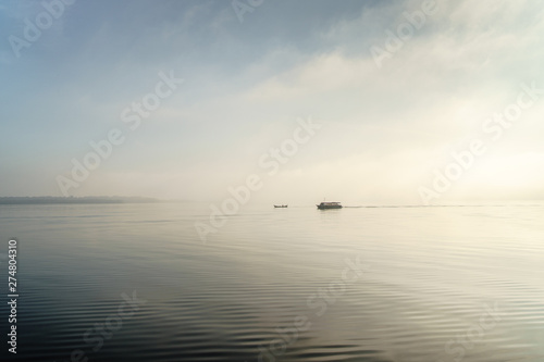 Boats in a amazing morning sunlight in Paranaguá Bay, Brazil