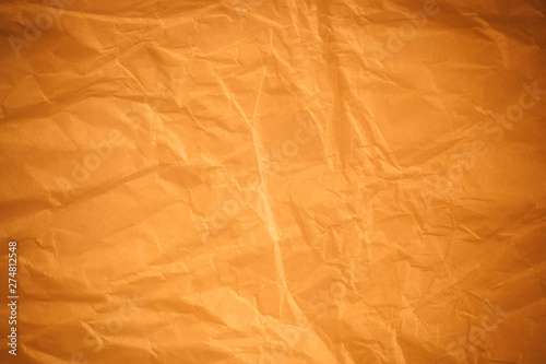 Brown crumpled paper background.