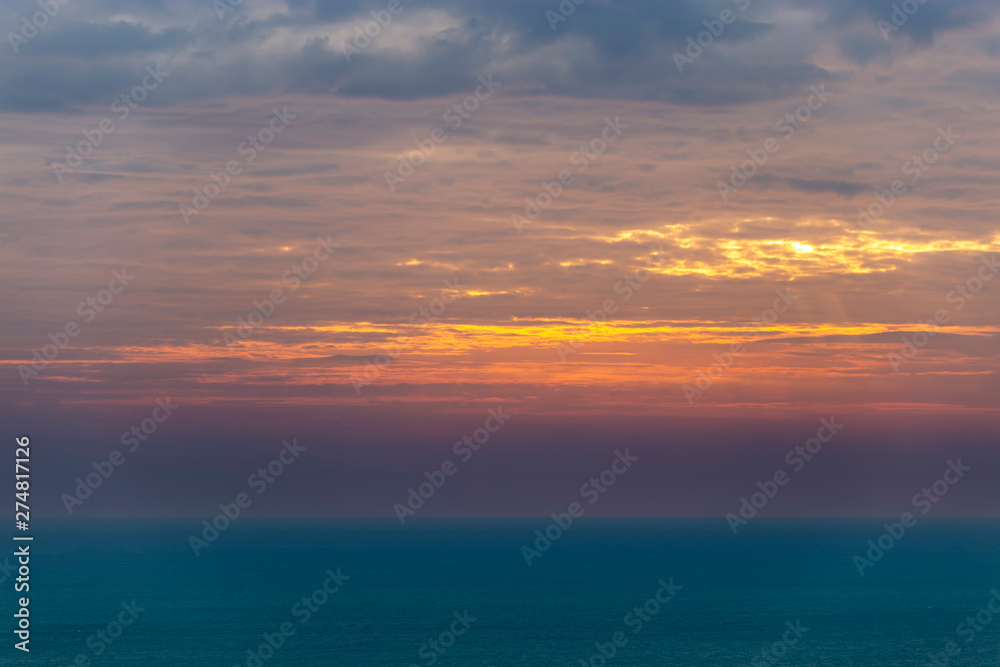 Sunset with cloud and sea