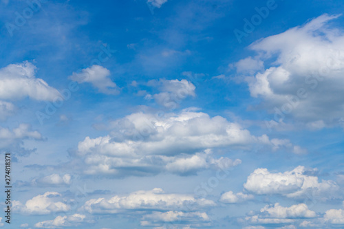 Source clouds in front of blue sky