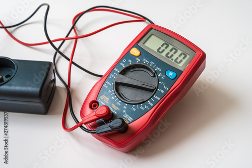 Measurement of voltage in electrical socket - digital multimeter